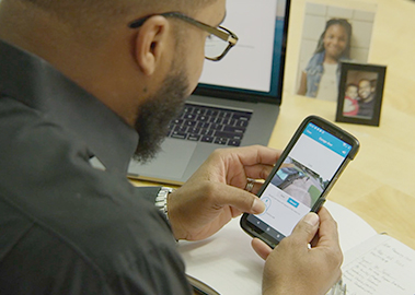 Man viewing live from his phone